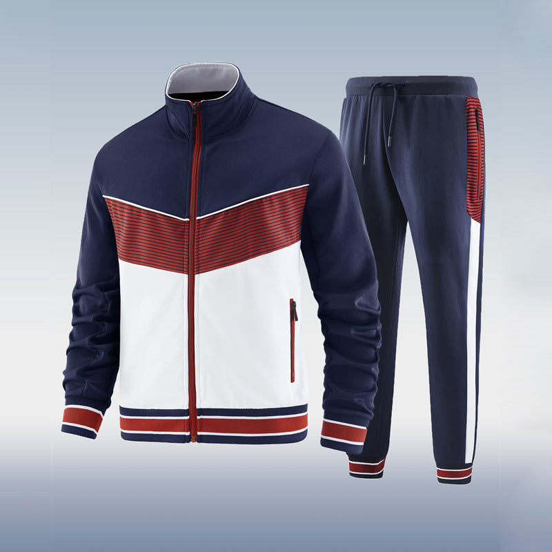 Navy, white, and red tracksuit on a light gray background