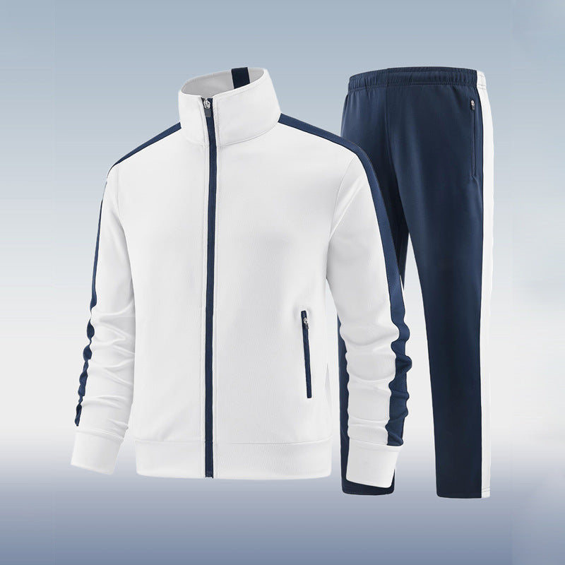 White and navy tracksuit on a light gray background