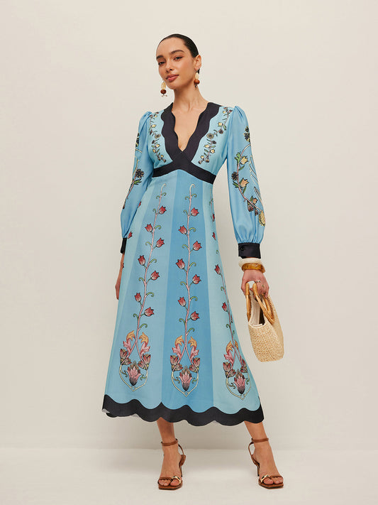 Vestido floral con mangas abullonadas y espalda abierta
