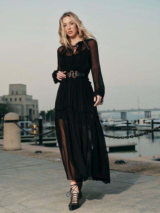 Vestido semitransparente de gasa con volantes