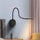 Lámpara de pared minimalista de silicona con foco LED recargable por USB para lectura