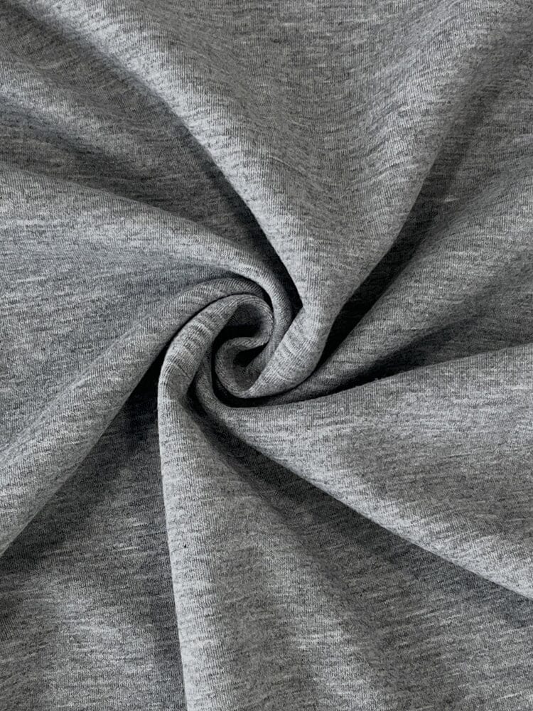 Close-up of gray fabric with a swirl pattern