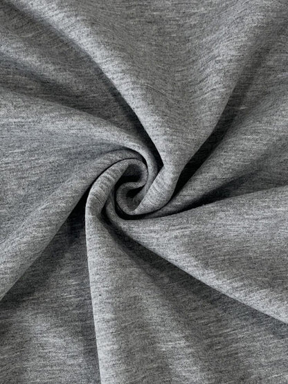 Close-up of gray fabric with a swirl pattern