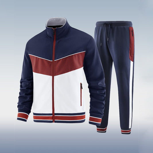 Navy, white, and red tracksuit on a light gray background