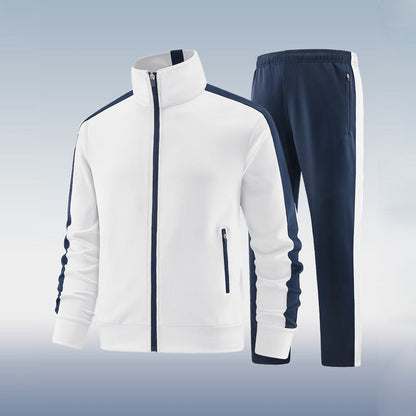 White and navy tracksuit on a light gray background