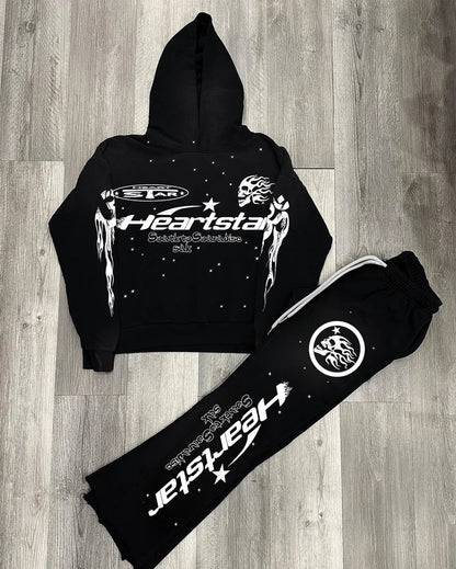 Black hoodie and pants set with 'Heartstar' branding on a wooden floor.