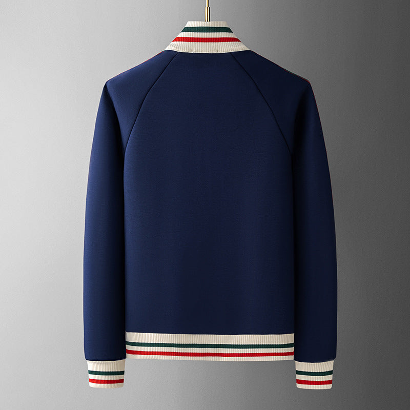 Navy blue jacket with striped cuffs on a gray background