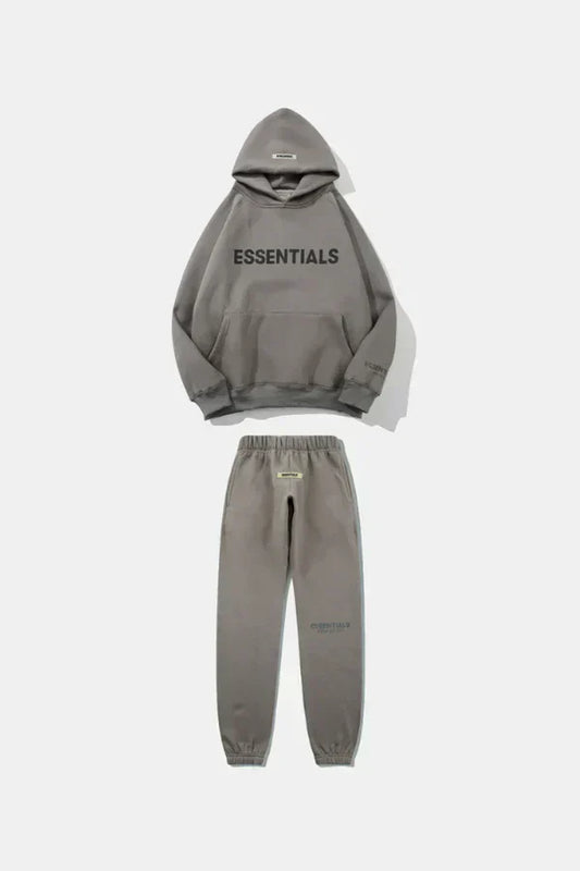Gray hoodie and jogger pants set with 'ESSENTIALS' text on a white background