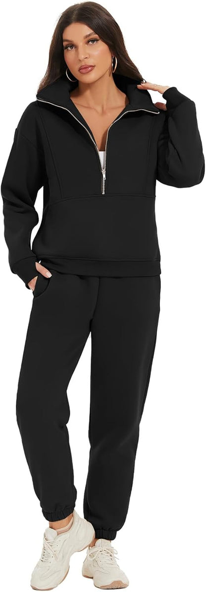 Woman wearing a black tracksuit with a white background