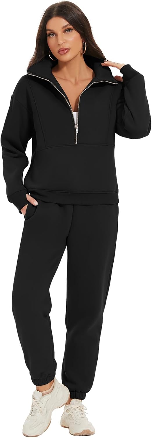 Woman wearing a black tracksuit with a white background