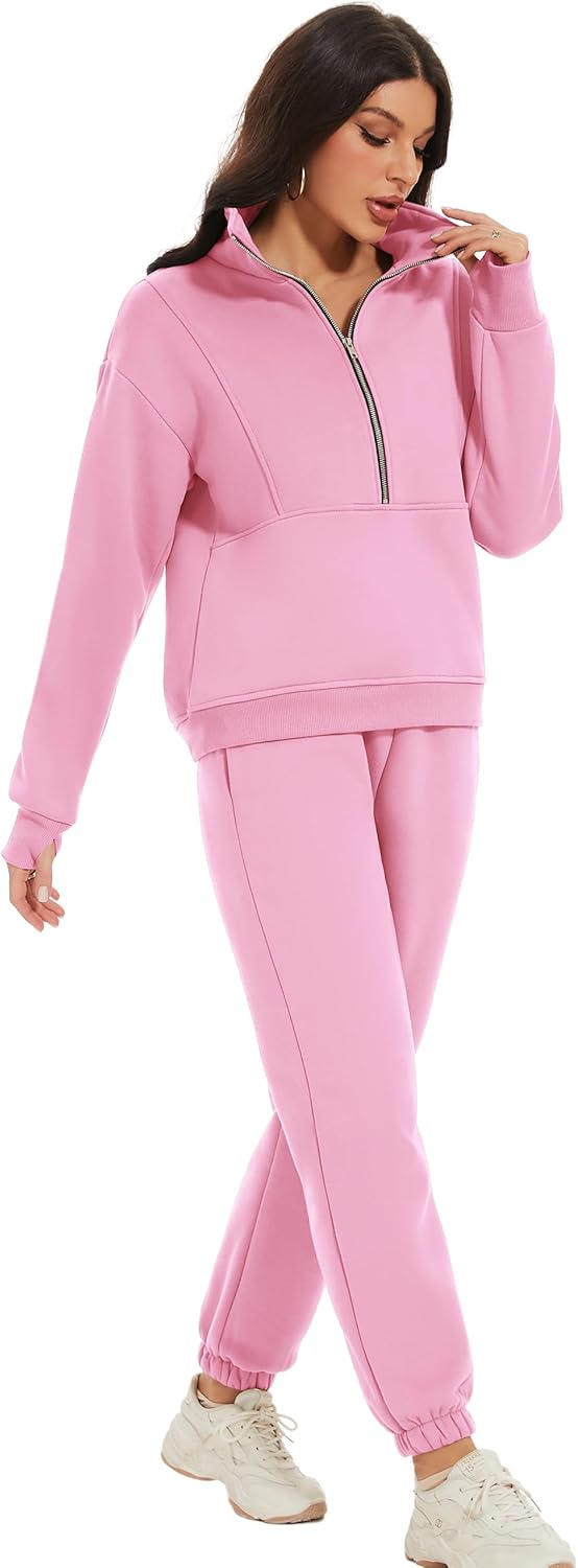 Woman wearing a pink tracksuit on a white background