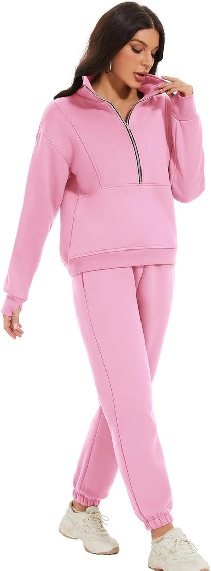 Woman wearing a pink tracksuit on a white background