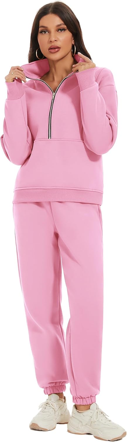 Woman wearing a pink tracksuit on a white background