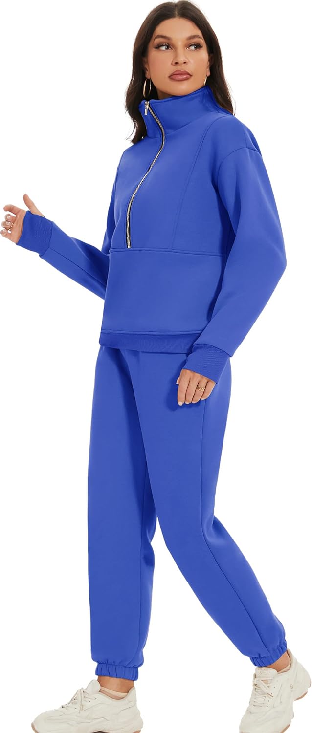 Woman wearing a blue tracksuit with a white background