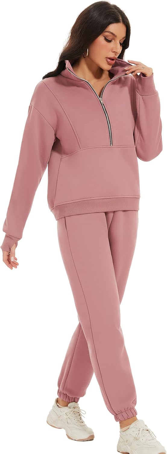 Woman wearing a pink tracksuit on a white background