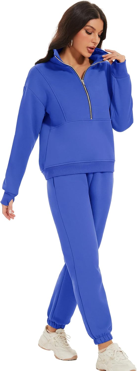 Woman wearing a blue tracksuit on a white background