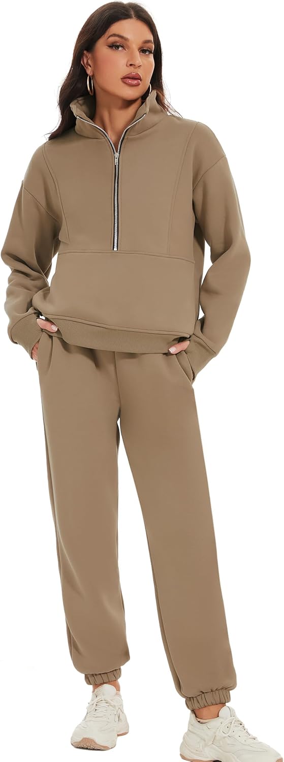 Woman wearing a beige tracksuit on a white background