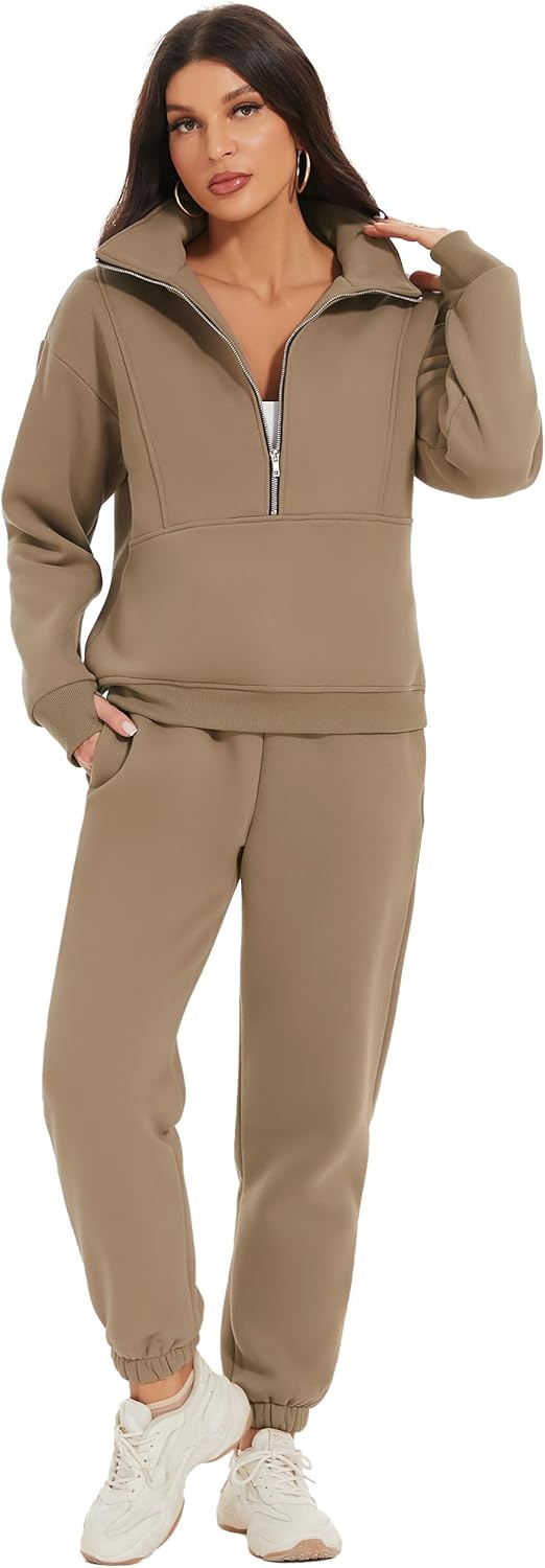 Woman wearing a beige tracksuit on a white background