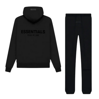 Black hoodie and pants set with 'ESSENTIALS' text on a white background