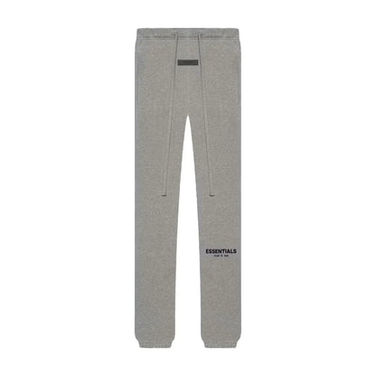 Gray sweatpants with 'ESSENTIALS' logo on a white background