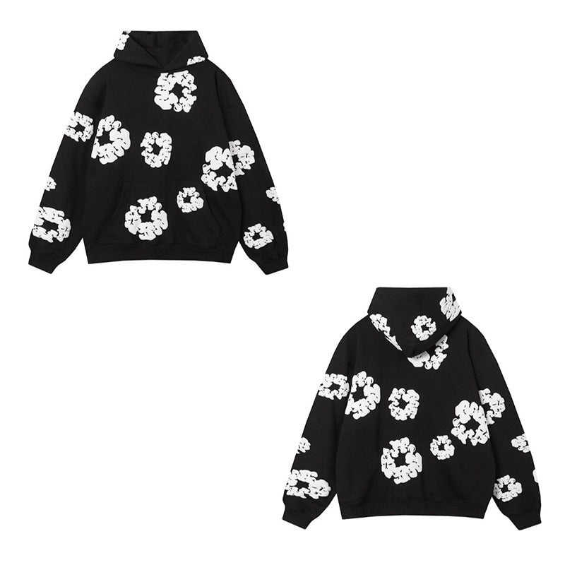 Black hoodie with white floral patterns on a white background