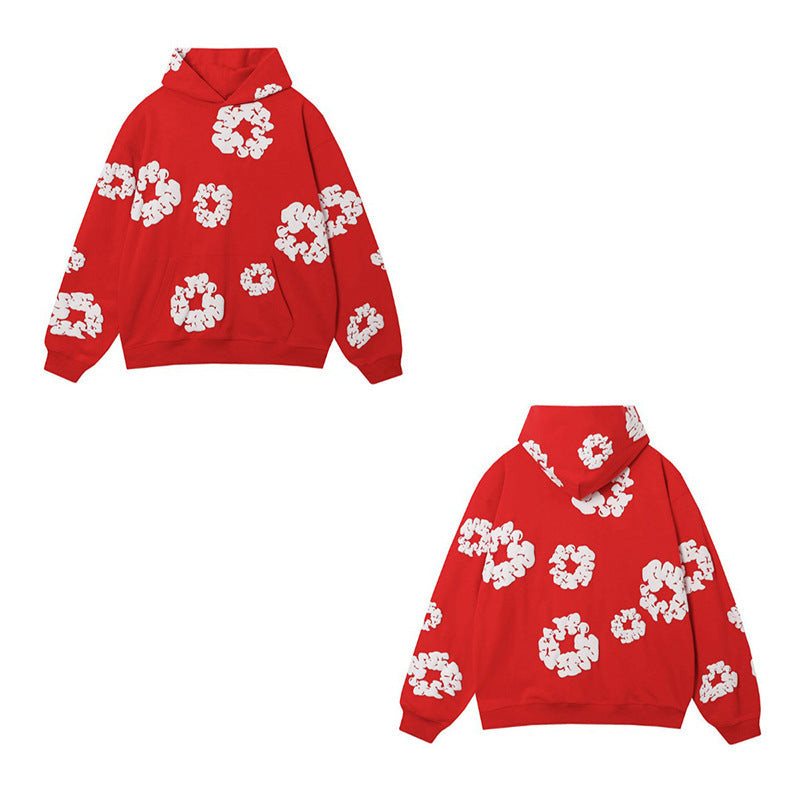 Red hoodie with white floral patterns on a white background