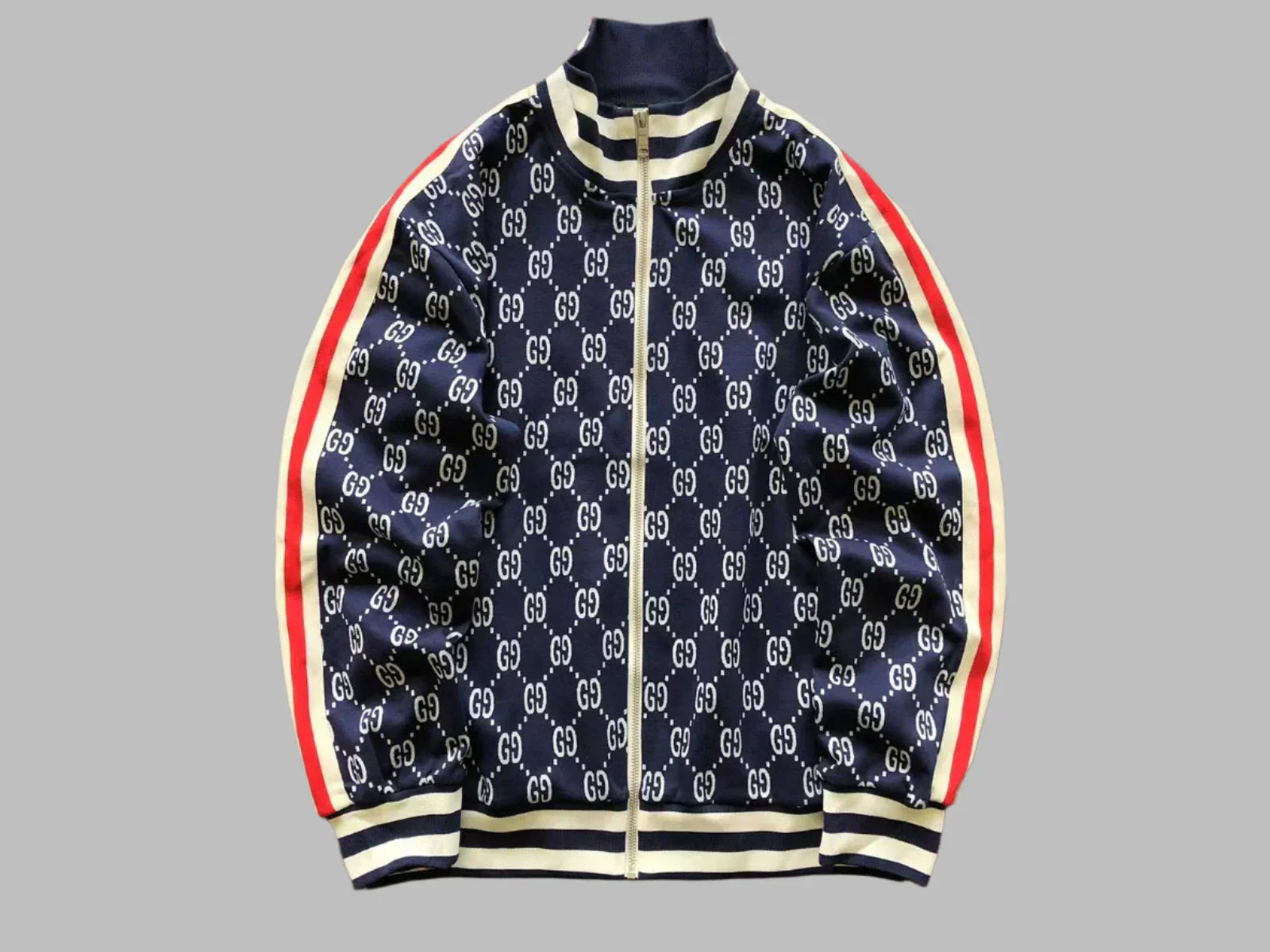 Navy blue jacket with red and white accents on a gray background