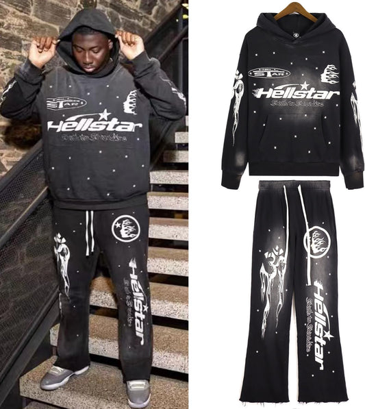 Black tracksuit with 'Hellstar' branding worn by a person on stairs, with separate image of tracksuit on hanger.