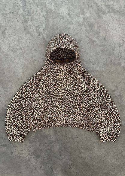 Leopard print poncho on a gray background