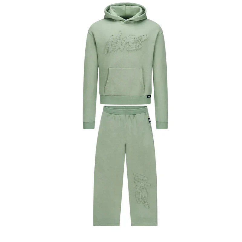 Green tracksuit with hood and pants on a white background