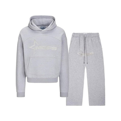 Gray hoodie and pants set on a white background