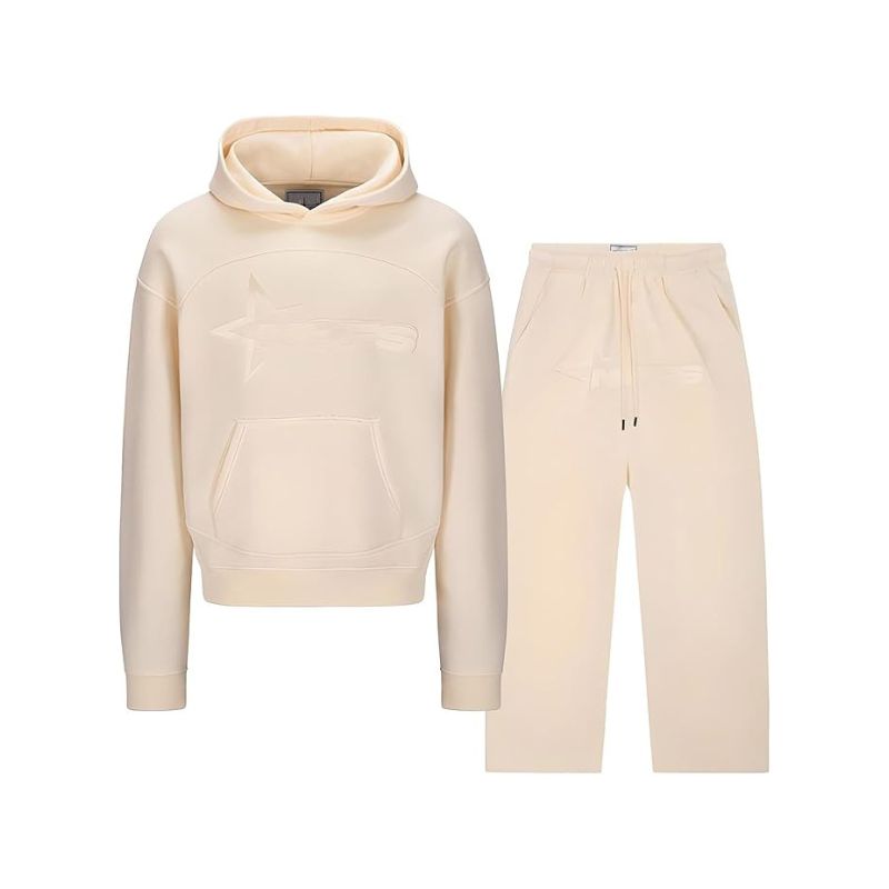 Beige hoodie and pants set on a white background