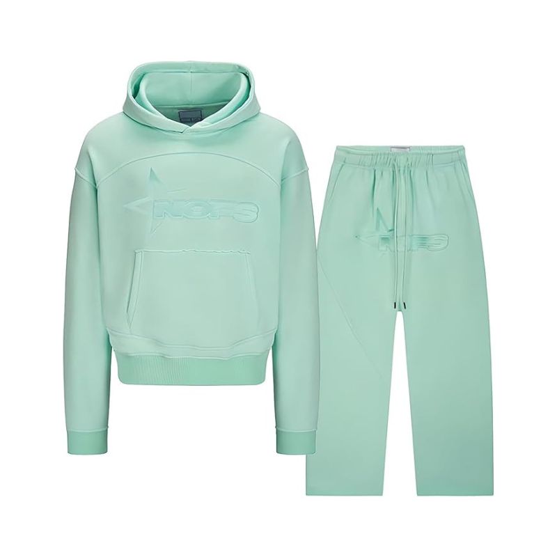 Mint green hoodie and pants set on a white background