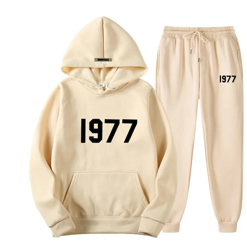 Beige hoodie and pants set with '1977' print on a white background