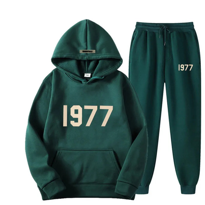 Green hoodie and pants set with '1977' text on a white background