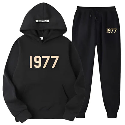 Black hoodie and pants set with '1977' text on a white background