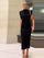 Vestito aderente midi sexy senza maniche con scollo a O, spacco posteriore sottile