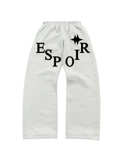 White sweatpants with 'ESPOIR' text and star design on a white background