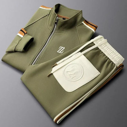 Folded green tracksuit with a logo on a gray background