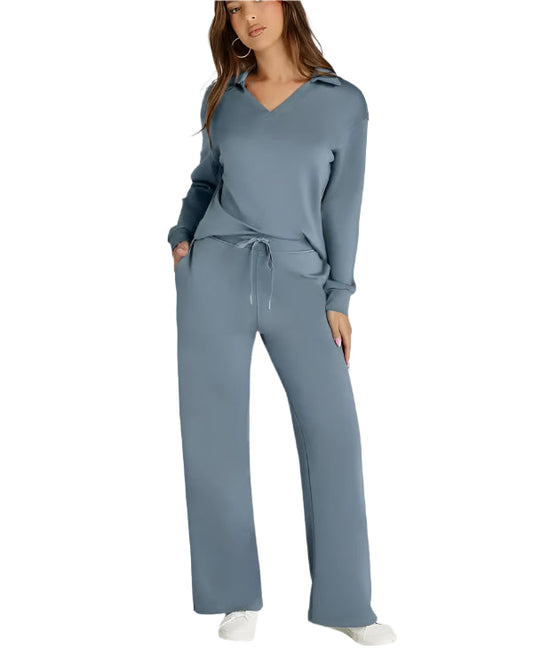 Woman wearing a blue loungewear set on a white background