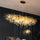 Lustre cascade en forme de goutte d'eau avec branche d'arbre en or moderne de luxe
