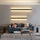 Lámpara de pared lineal minimalista con iluminación ambiental LED