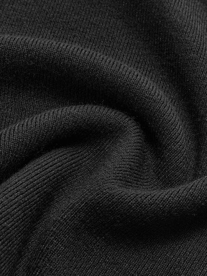 Top de punto floral sólido de manga larga