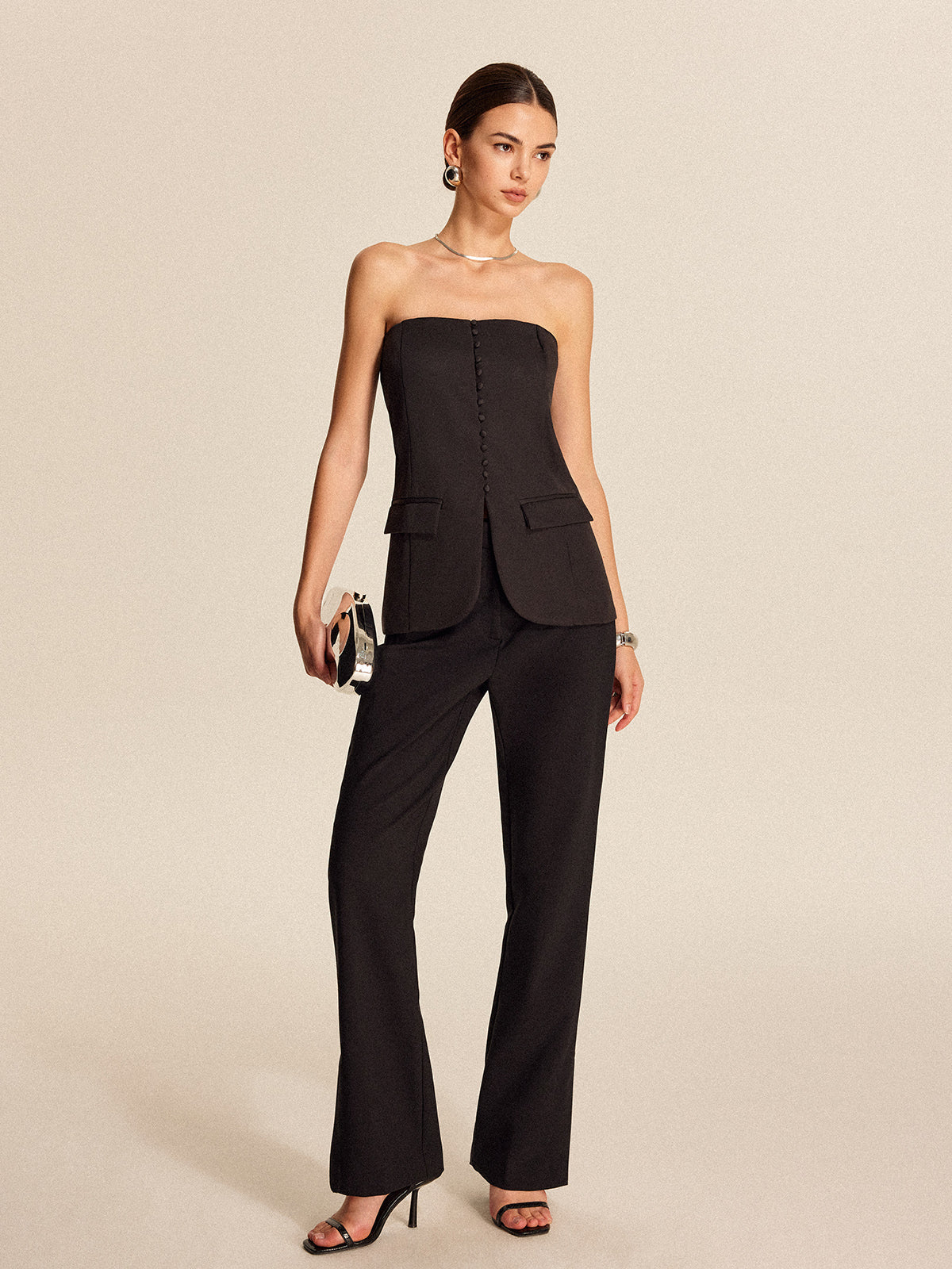 Strapless top met knopen aan de voorkant