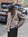 Women's jacket with stand-up collar and button closure